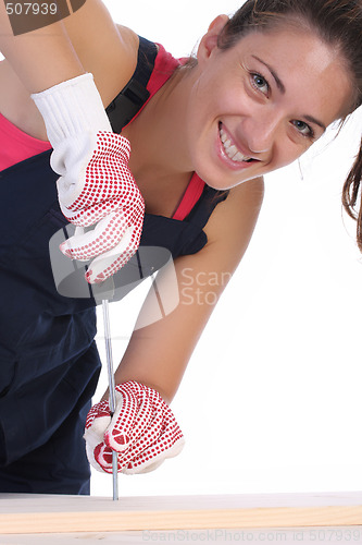 Image of woman carpenter at work 