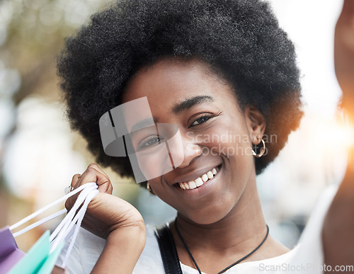 Image of Woman, selfie and shopping bag in city for social media, student sale and outdoor, happy portrait. Face of young african person or influencer smile in profile picture photography for retail or gift