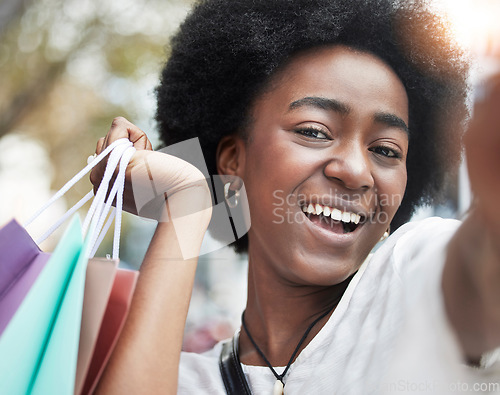 Image of Woman, portrait selfie and shopping bag in city for social media, sale and happy winner or student. Face of young african person or influencer smile in profile picture photography for retail or gift