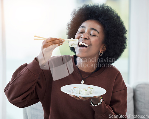 Image of Happy, eating and black woman with sushi and chopsticks for salmon, seafood and healthy dinner in home with ecommerce. Fish, dish and person excited for food delivery and smile on face for lunch