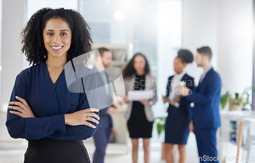 Image of Crossed arms, leadership and portrait of businesswoman in the office with confidence, smile and team. Career, professional and young female corporate lawyer from Colombia in workplace with colleagues