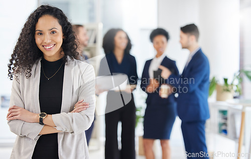 Image of Smile, crossed arms and portrait of businesswoman in the office with confidence, happiness and collaboration. Career, professional and young female lawyer from Mexico with legal team in the workplace