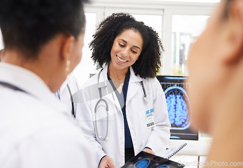 Image of Happy woman, doctor and tablet with brain scan in neurology, healthcare or meeting in team planning at hospital. Female person or medical professional smile with technology, CT or MRI at the clinic