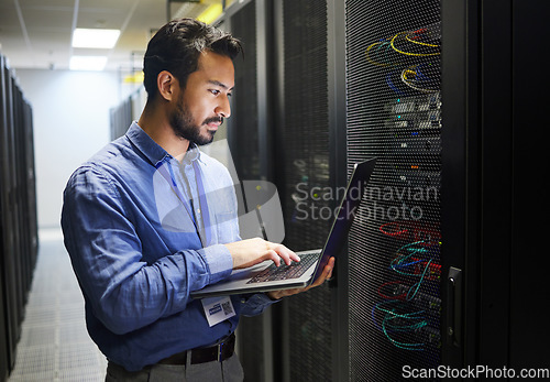 Image of Man, engineering laptop and data center, server room inspection or system solution, coding and business network. IT person on computer for tech upgrade, gdpr programming and hardware problem solving