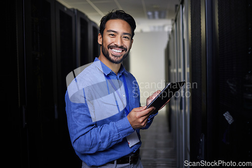 Image of Tablet, man and portrait in server room of engineer programming at night. Information technology, face and happy Asian technician in data center, networking and coding software of system admin expert