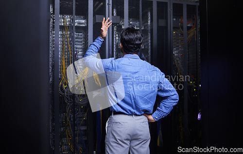 Image of Server room, stress or male technician with hardware or cables for cybersecurity glitch or machine problem. Doubt, risk or back of confused man fixing network for information technology or IT support