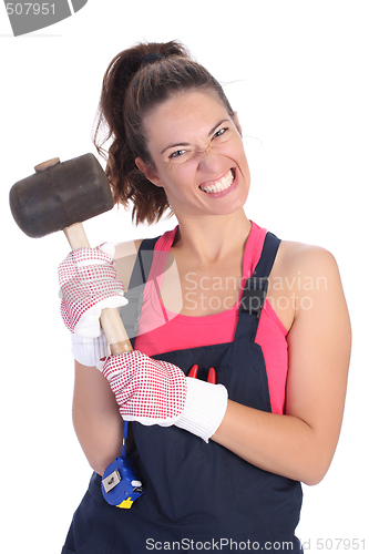 Image of woman with black rubber mallet