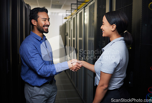 Image of Handshake, partnership or happy people in server room of data center for network help with IT support. B2b deal agreement, teamwork or engineers shaking hands together in collaboration for solution