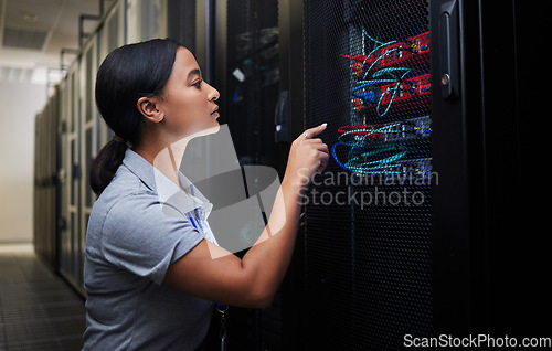 Image of Woman, cable and engineer in server room to check inspection of cloud computing. Information technology, wire and technician in data center, networking in maintenance or cybersecurity of system admin