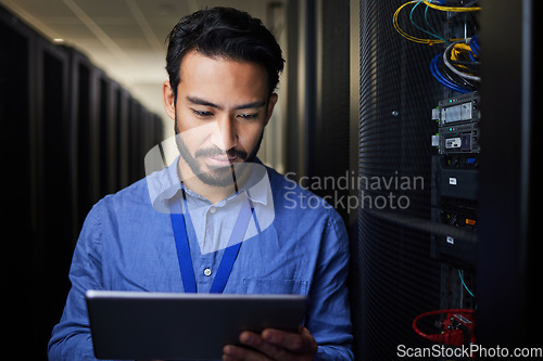 Image of Tablet, man and engineer in server room on research for programming at night. Information technology, inspection and technician in data center reading, network maintenance or typing code for software