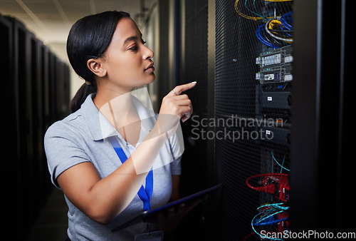 Image of Woman, technology and inspection of server room, engineering cables and power solution or hardware problem solving. Technician on tablet, cybersecurity check and data center programming in basement