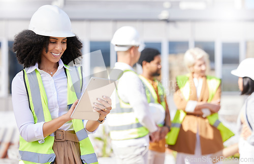 Image of Tablet, architecture and a black woman construction worker on a building site with her team in the city. Technology, planning and safety with a female designer reading a blueprint on the internet