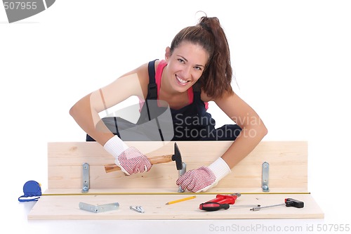 Image of woman carpenter at work 