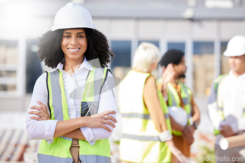 Image of Woman, architect and arms crossed, construction site with maintenance, contractor job and smile in portrait outdoor. Professional, confident and civil engineering, urban infrastructure and renovation