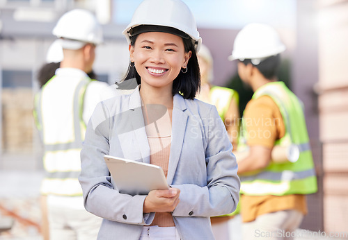 Image of Woman, architect and tablet, inspection at construction site with maintenance, contractor and smile in portrait. Asian engineer, check digital floor plan and tech, urban infrastructure and renovation