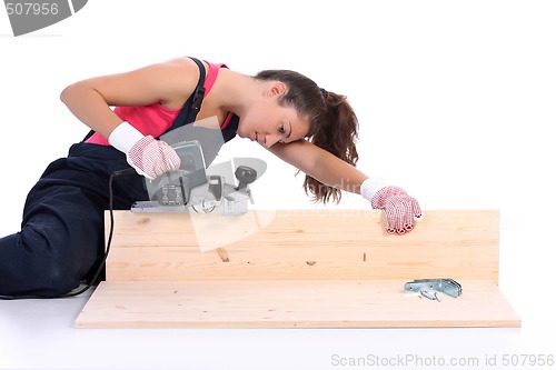 Image of woman carpenter at work