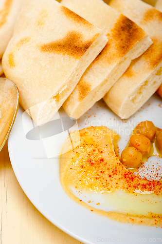 Image of Hummus with pita bread