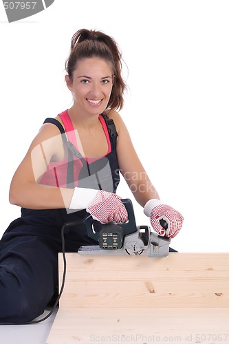 Image of woman carpenter at work