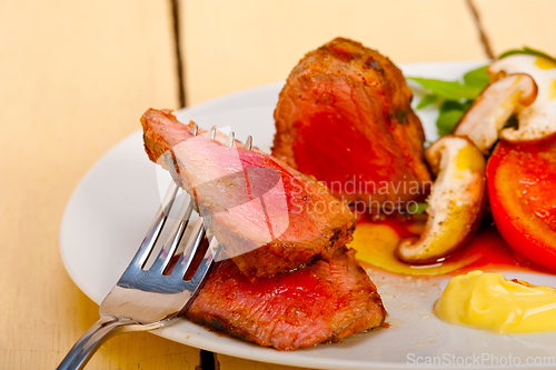 Image of beef filet mignon grilled with vegetables