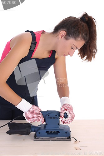 Image of woman carpenter at work