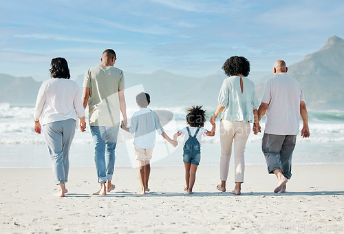 Image of Back, beach and family holding hands, vacation and summer break with bonding, ocean and travel. People, grandparents and mother with father, children and love with seaside holiday, care and adventure