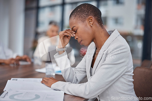 Image of Stress, black woman and a headache from a marketing project, office and business burnout. Tired, sad and an African employee with a migraine from anxiety, mental health and mistake with data