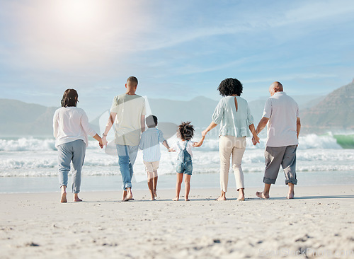 Image of Back, beach and family holding hands, walking and summer vacation with bonding, love and travel. People, grandparents and mother with father, children and kids with seaside holiday, ocean and care