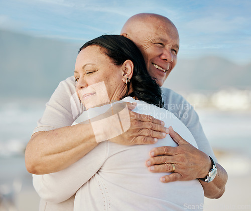 Image of Happy, love and hug with old couple at beach for travel, support and summer vacation. Relax, bonding and retirement with senior man and woman on seaside holiday for trust, health and marriage