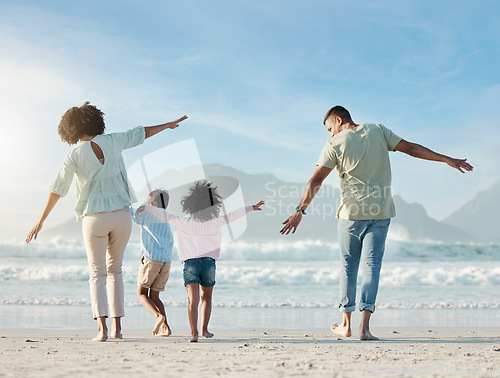 Image of Playing, airplane and family on beach with freedom on vacation, holiday or summer in Brazil with parents and children. Mom, dad and kids play game as plane to fly for fun, bonding and happiness