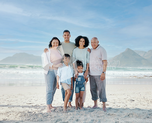 Image of Portrait, children and a family on the beach in summer together for holiday or vacation by the ocean. Love, nature or freedom with parents and grandparents at the sea for bonding or weekend travel