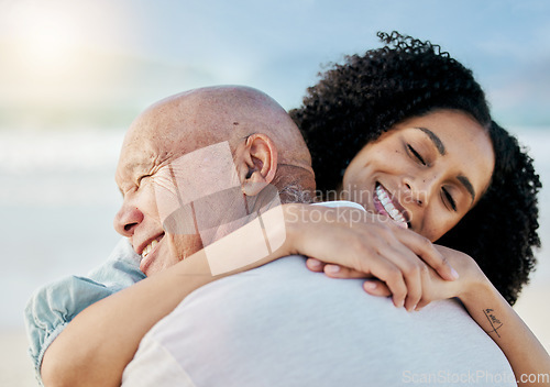 Image of Hug, beach and woman with her senior father on family vacation, holiday or adventure. Happy, smile and young female person from Mexico embracing her elderly dad with love by the ocean on weekend trip