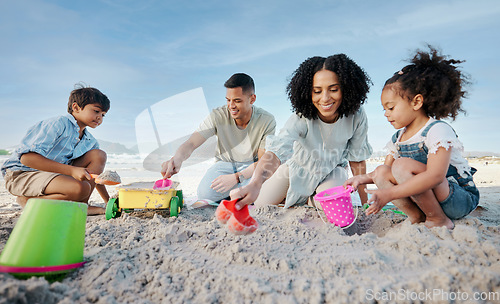 Image of Parents, kids and sandcastle at beach, bucket and digging for bonding, outdoor and vacation in summer. Mom, dad and siblings with plastic toys, sand or construction game for holiday, happy and ocean