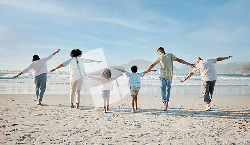 Image of Playing, together and big family on beach, vacation or holiday freedom in summer with children and generations flying. Parents, grandparents and kids play game to fly, airplane for fun and happiness