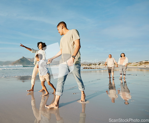 Image of Big family, holding hands and walking at the beach with conversation, relax and bond on blue sky background. Love, child and parent with grandparent at the ocean for travel, fun and freedom in Bali
