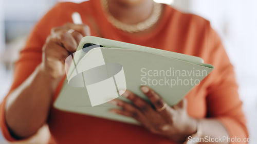 Image of Woman, hands and tablet writing inventory checklist in fashion boutique for marketing, stock or quality check at office. Hand of female working on touchscreen, mobile app or strategy at the workplace