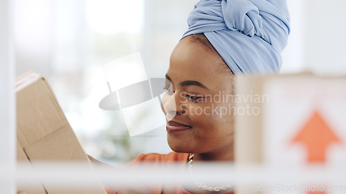 Image of Black woman, laptop and typing in logistics for schedule delivery, order or ecommerce in fashion business. African American female working on computer in digital marketing for shipping information