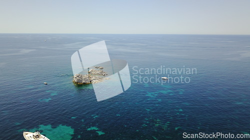 Image of Ocean, landscape and island in water, sea or view of coral reef in tropical Mexico, travel or summer adventure on yacht. Aerial, drone and cruise to land with sailing, boat and blue world or nature