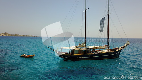 Image of Yacht, sailing in Greece and summer on ocean holiday, relax in freedom and peace in nature on blue water. Boat vacation, travel in sun and tropical cruise on sea adventure to with island beach fun.