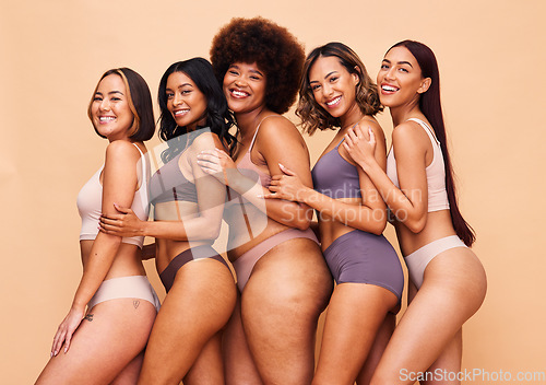 Image of Body positive, diversity and portrait of women happy in studio for wellness, beauty and self love. Underwear campaign, natural and people on brown background for confidence, skincare and inclusion