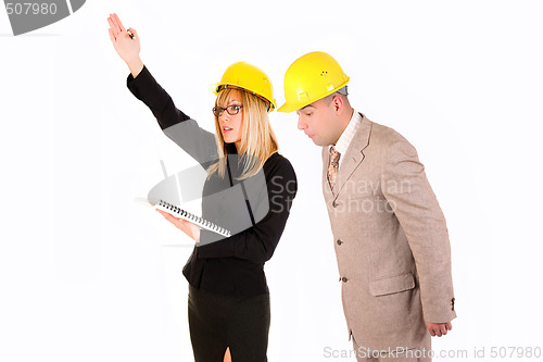 Image of angry businesswoman and architect