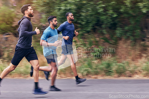 Image of Running, fitness and men in a road for training, speed and energy, health and cardio routine in nature. Sports, diversity and man friends on practice run for competition, workout or endurance goal