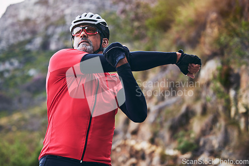 Image of Man, cyclist and stretching body on mountain in sports fitness, workout or outdoor exercise in nature. Active male person or athlete in warm up, cycling or ready for cardio marathon or training