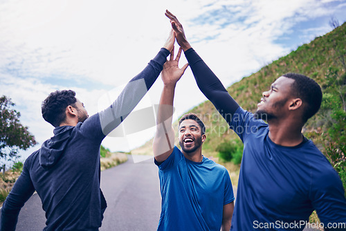 Image of High five, men and outdoor with fitness, workout and runner training on mountain path. Excited, friends and motivation with wellness success and sports exercise of people together with support