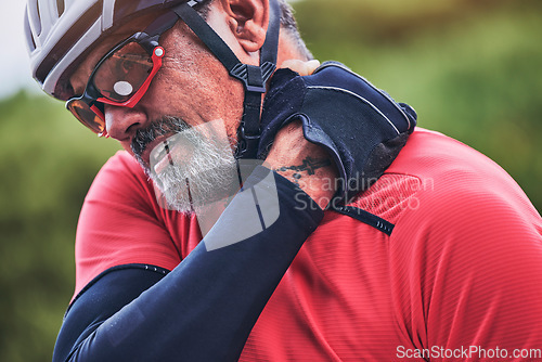 Image of Man, cyclist and neck injury in sports accident, emergency or broken bone and fitness in nature. Closeup of male person or athlete with sore pain, ache or joint inflammation from cycling or fall