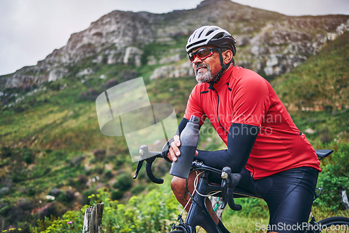 Image of Fitness, cycling and water with man on bike in nature for sports, training and challenge. Exercise, workout and health with mature person on bicycle in mountains for energy, freedom and performance