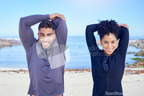 Image of Beach portrait, exercise and happy couple stretching arm for outdoor sports, fitness and athlete start workout. Teamwork, happiness and relax nature team doing partner warm up, wellness or training