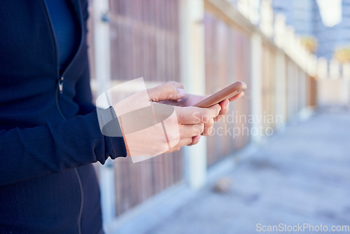 Image of Phone, hands and person outdoor for location, search or internet, maps and travel guide with text in city street. Smartphone, app and online for social media, notification or web chat while waiting