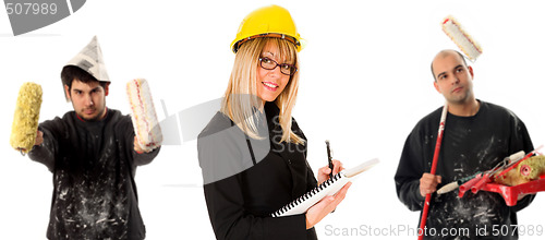 Image of businesswoman and two house painter 