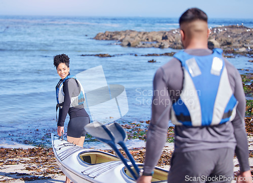 Image of Water sports, man and woman with kayak, walking on sand at lake or beach for exercise together at vacation. Ocean holiday, adventure and fitness, happy couple helping with canoe for training workout.