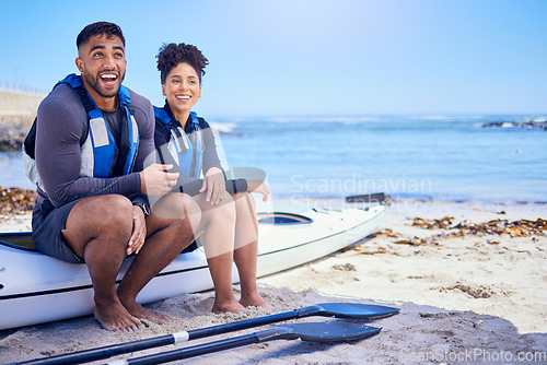 Image of Couple, happy and outdoor for kayak or travel at a beach with a partner for teamwork. A man and woman with a canoe for paddle sports, water adventure and vacation or freedom with space in nature